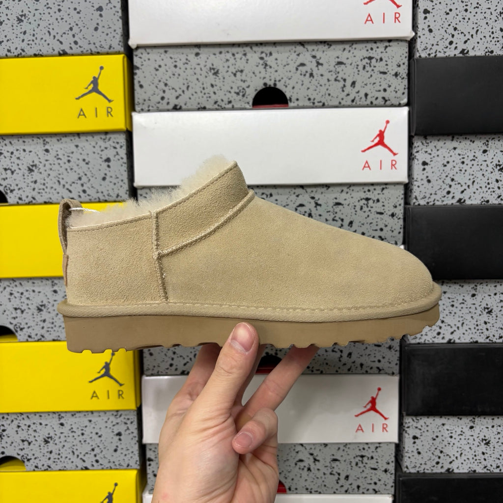 UGG Low-Cut Slip-On Shoes in Sand with Plush Lining