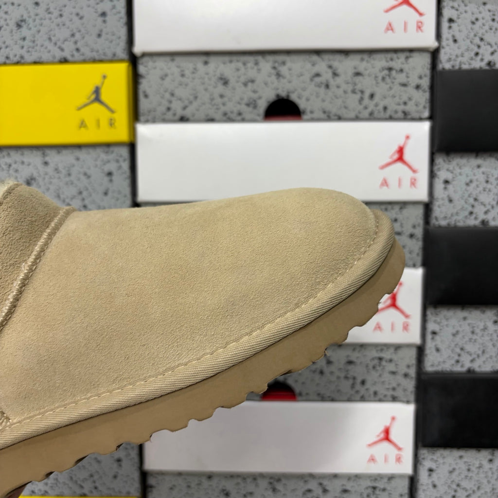 UGG Low-Cut Slip-On Shoes in Sand with Plush Lining