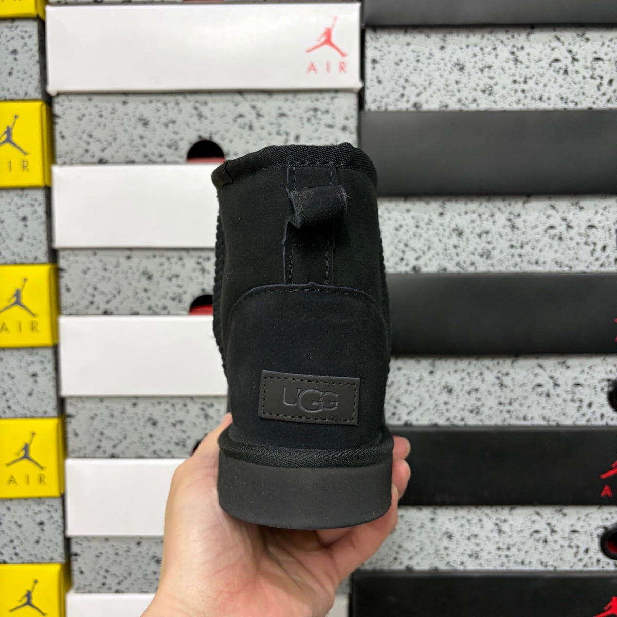 UGG Classic Mini Pull-On Boots in Black with Plush Lining