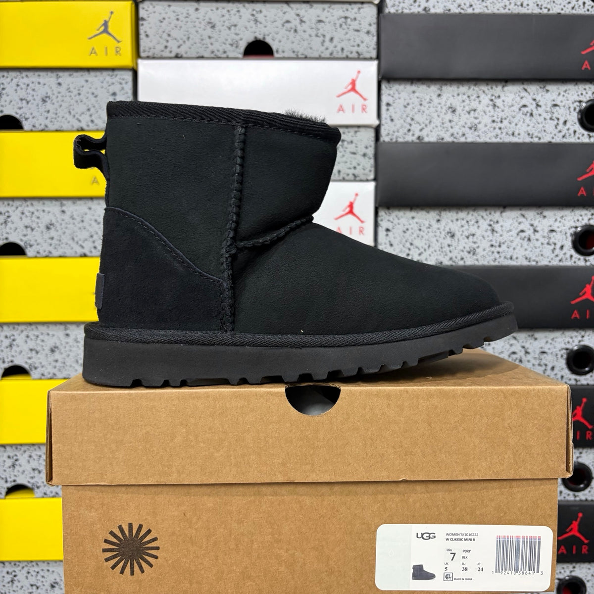 UGG Classic Mini Pull-On Boots in Black with Plush Lining