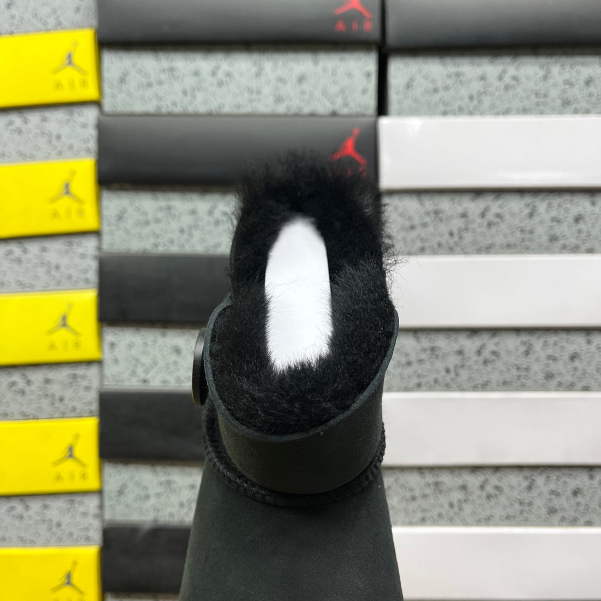 UGG Button-Detail Mini Boots in Black with Plush Lining
