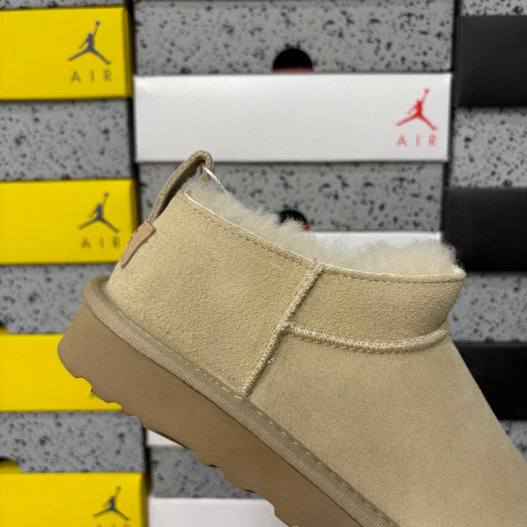 UGG Low-Cut Slip-On Shoes in Sand with Plush Lining