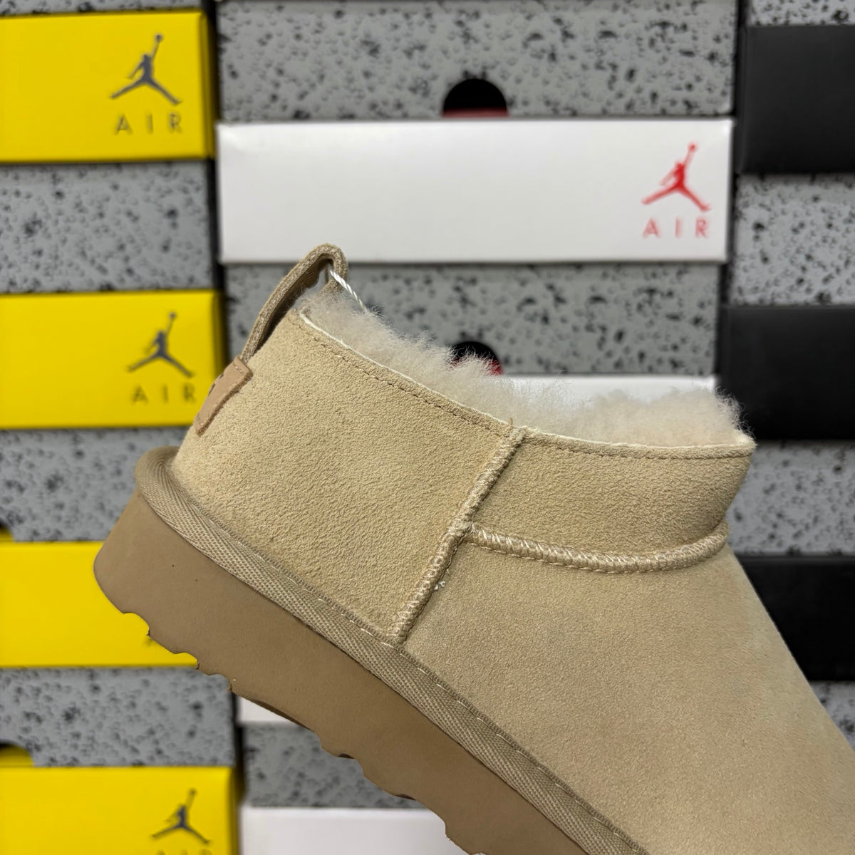 UGG Low-Cut Slip-On Shoes in Sand with Plush Lining
