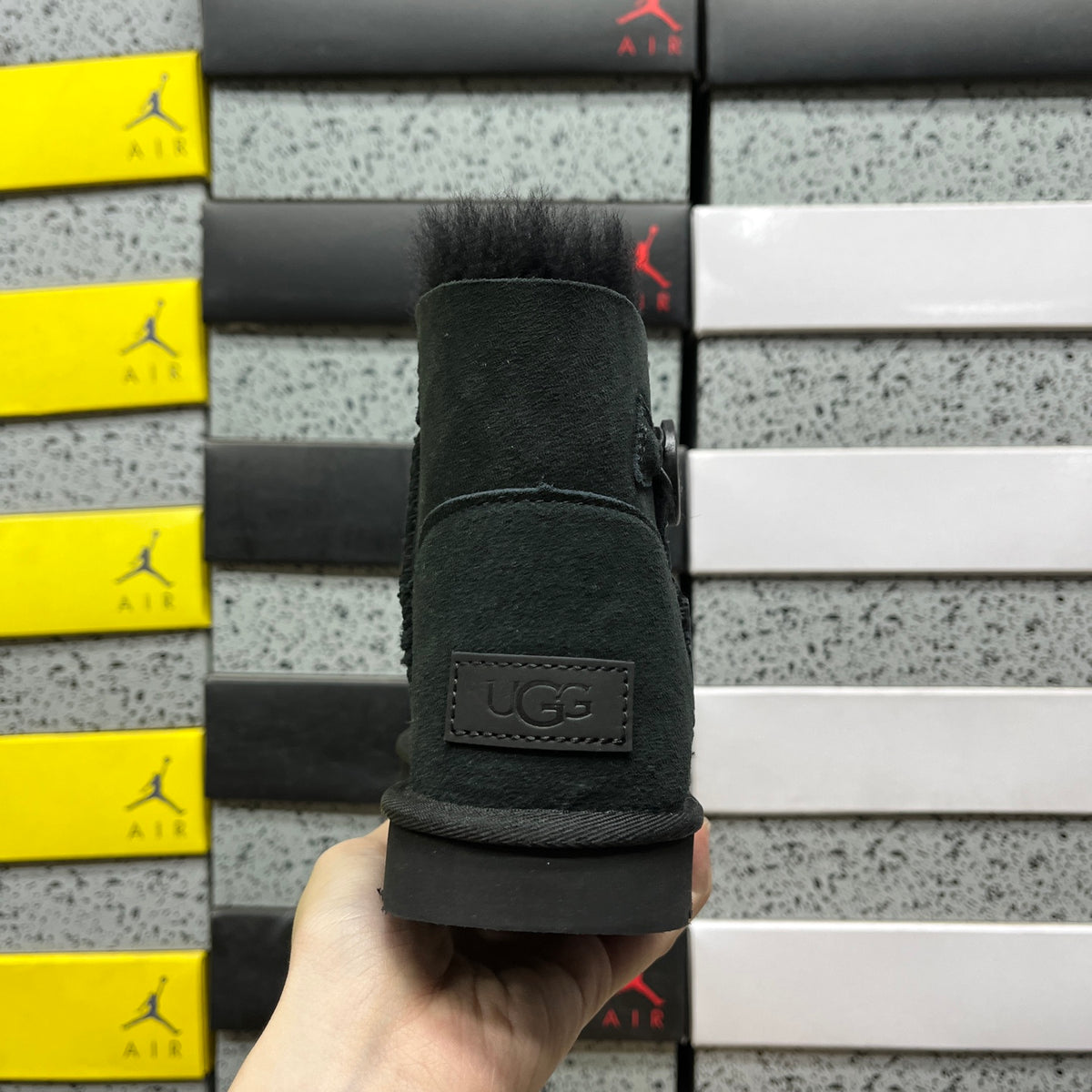 UGG Button-Detail Mini Boots in Black with Plush Lining