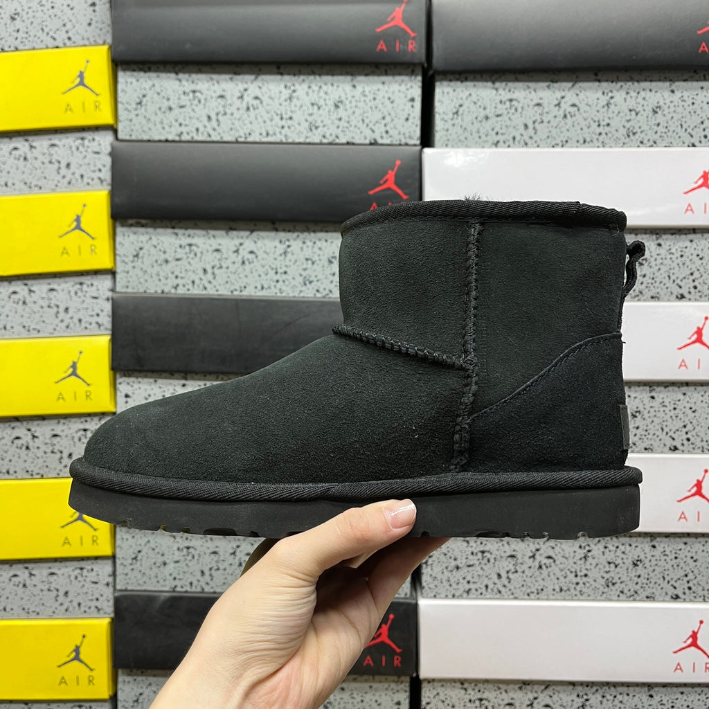 UGG Classic Mini Boots in Black with Plush Lining