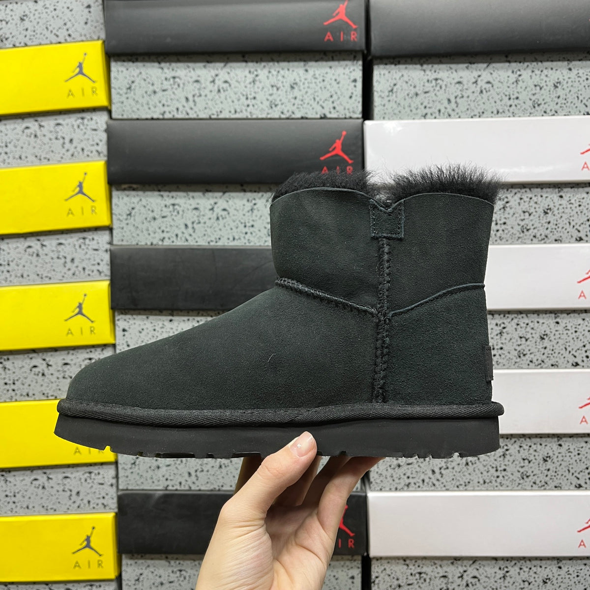UGG Button-Detail Mini Boots in Black with Plush Lining
