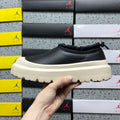 UGG Leather Slip-On Shoes in Black with Cream Chunky Sole