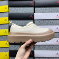 UGG Leather Slip-On Shoes in White with Tan Chunky Sole