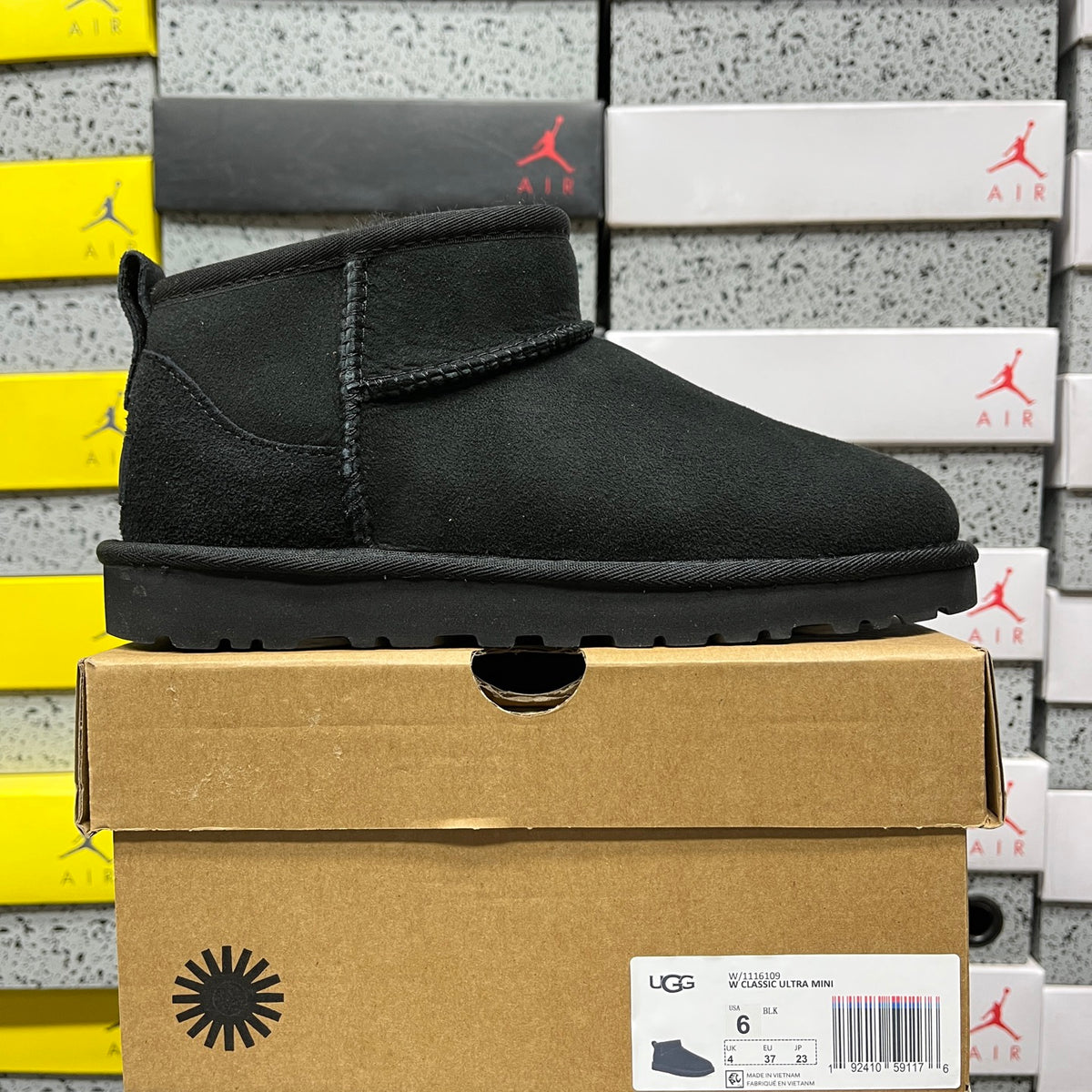 UGG Ultra Mini Pull-On Boots in Black with Plush Lining