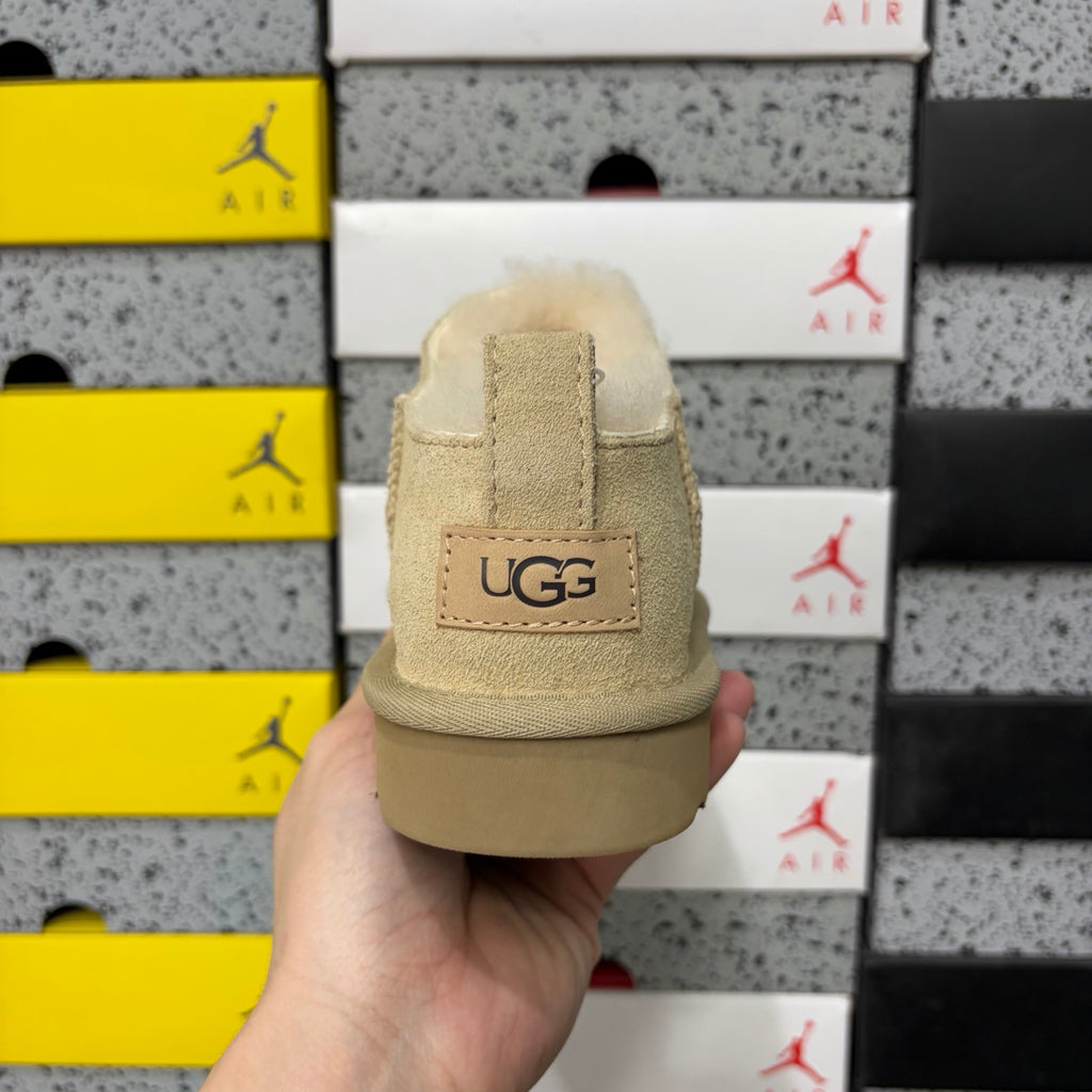 UGG Low-Cut Slip-On Shoes in Sand with Plush Lining