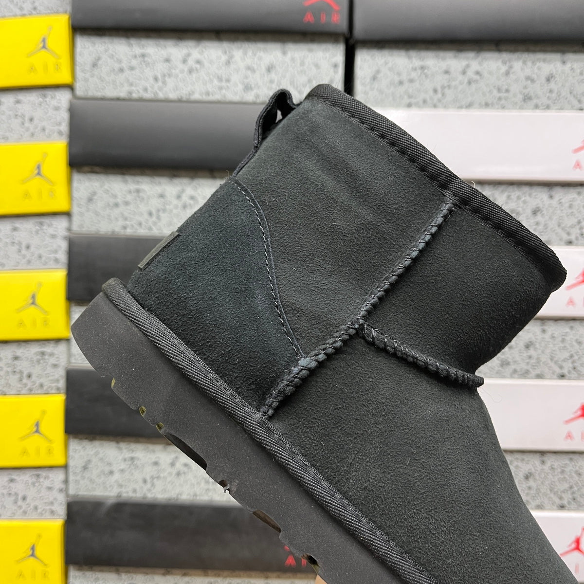 UGG Classic Mini Boots in Black with Plush Lining